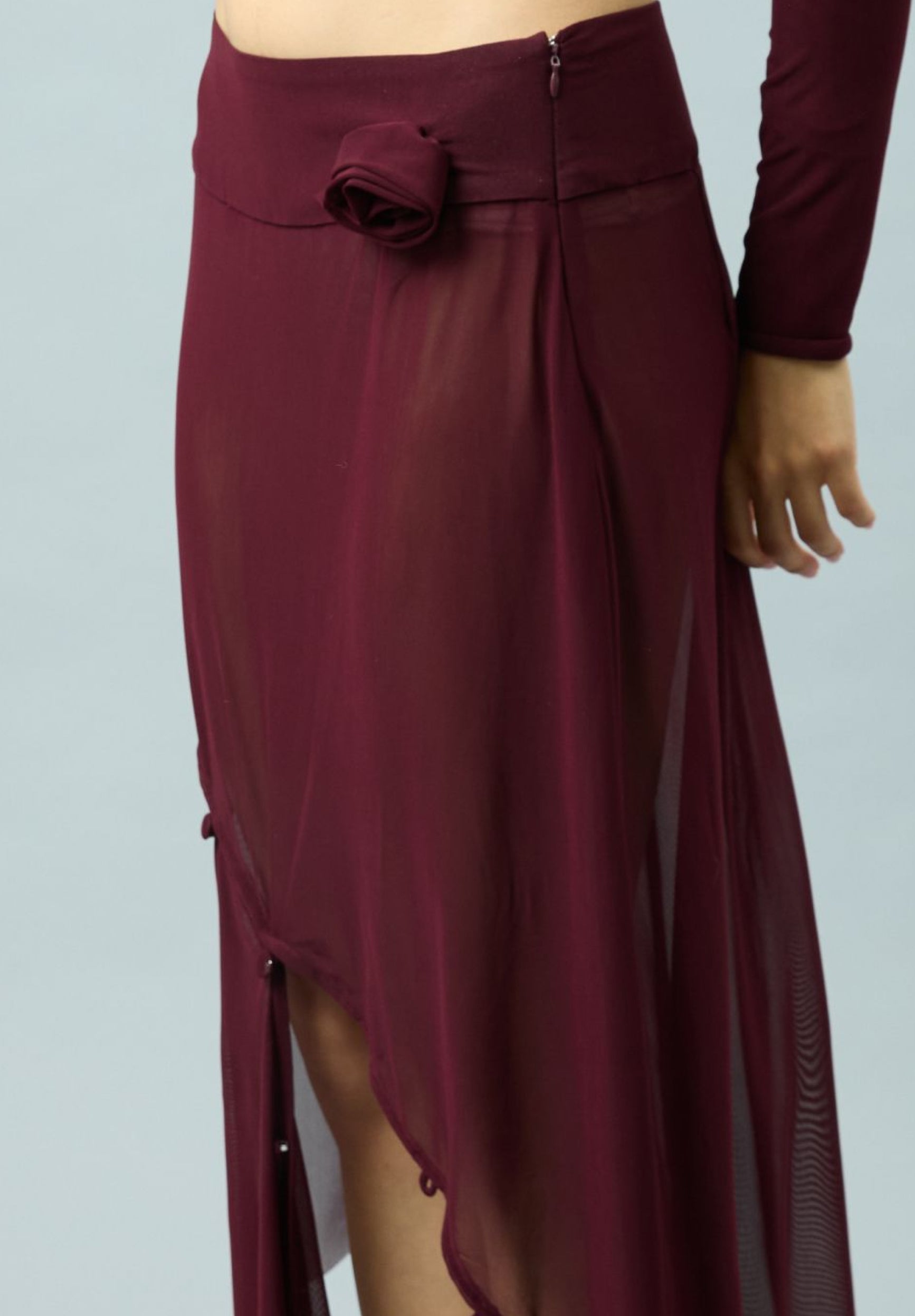 ASYMMETRIC MESH SKIRT WITH FLOWER APPLIQUE
